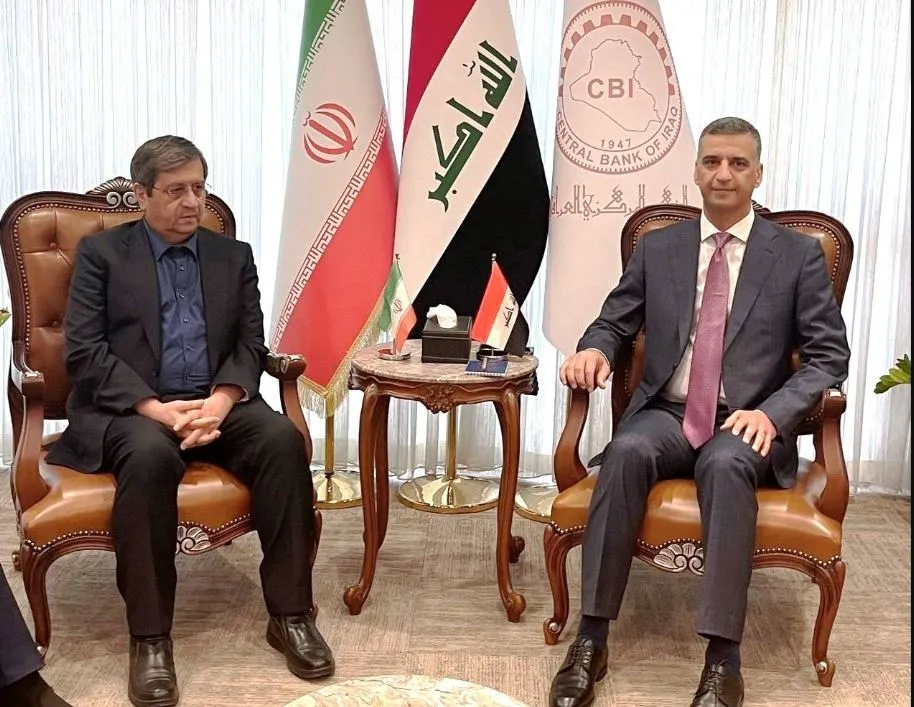 همتی در عراق: موانع بانکی برای استفاده از منابع ارزی ایران سریعاً رفع شود